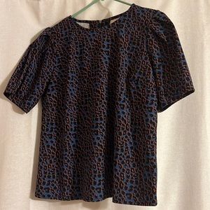 Funky blue, black, and orange leopard print shirt